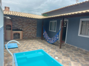 Casa com piscina a 500m da praia